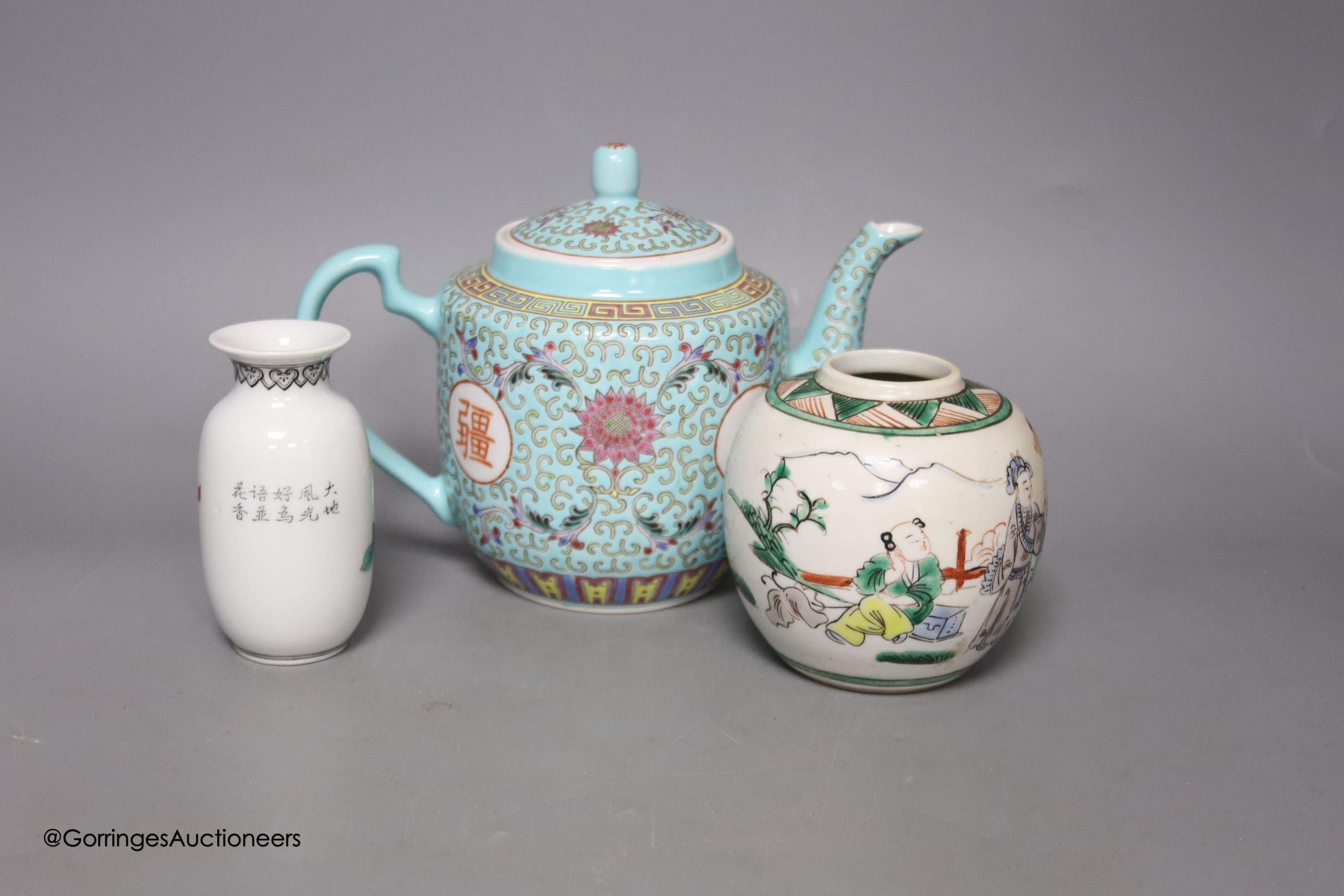 A Chinese turquoise ground teapot, 15.5cm high, a famille verte jar and a famille rose vase (3)